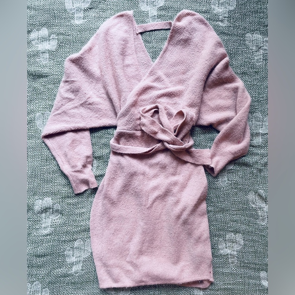 Beautiful sweater dress. Cozy and soft, perfect for Holiday events!